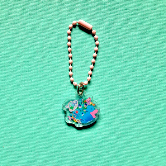 Porte-clé cute planete paradaise